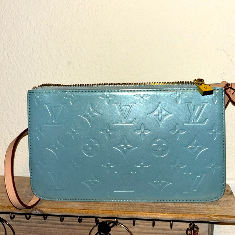 Vintage 1990s blue Louis Vuitton bag with pink strap